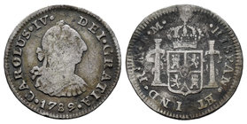 Charles IV (1788-1808). 1/2 real. 1789. México. FM. (Cal-1283). Ag. 1,57 g. Busto de Carlos III y numeral del rey IV. Golpes. Escasa. Choice F. Est......