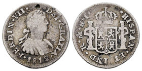 Ferdinand VII (1808-1833). 1/2 real. 1812. México. HJ. (Cal-1341). Ag. 1,53 g. Busto imaginario. Golpe de punzón. Choice F. Est...12,00.