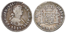 Ferdinand VII (1808-1833). 1/2 real. 1814. México. JJ. (Cal-1345). Ag. 1,60 g. Busto imaginario. Golpe en canto. Choice F. Est...15,00.