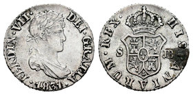 Ferdinand VII (1808-1833). 1/2 real. 1831. Sevilla. JB. (Cal-1398). Ag. 1,44 g. Leve oxidación en reverso. Almost VF. Est...25,00.