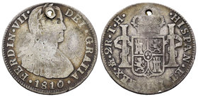 Ferdinand VII (1808-1833). 2 reales. 1810. México. TH. (Cal-939). Ag. 6,28 g. Busto imaginario. Agujero. Escasa. F. Est...12,00.