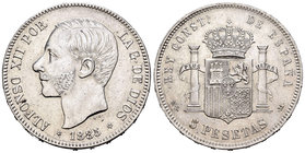 Alfonso XII (1874-1885). 5 pesetas. 1885*18-85. Madrid. MSM. Ag. 24,90 g. Ligeramente limpiada. Almost XF. Est...50,00.