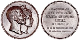 Alfonso XII
Medalla. AE. Madrid. 1879. Boda Real con María Cristina. Grabador Sellán. Golpecitos y rayitas. 229.95g. 71.00mm. VQ.14400. (MBC).