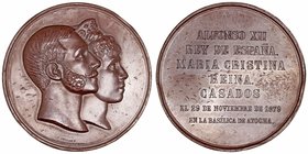 Alfonso XII
Medalla. AE. Madrid. 1879. Boda Real con María Cristina. Grabador Sellán. Golpes en canto. 226.93g. 71.00mm. VQ.14400. (MBC).