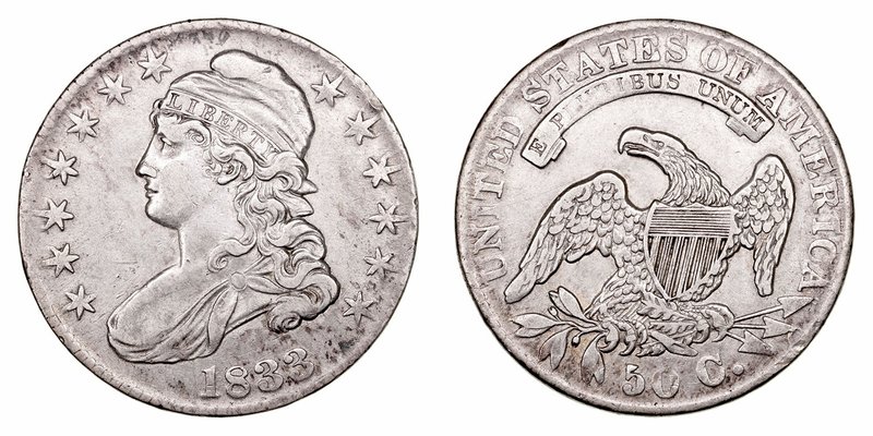 Estados Unidos 
1/2 Dólar. AR. 1833. Suave pátina. 13.48g. KM.37. Escasa así. M...