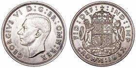 Gran Bretaña Jorge VI
Corona. AR. 1937. Suave pátina de monetario antiguo. 28.35g. KM.857. EBC.