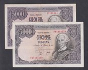 Juan Carlos I, Banco de España
5000 Pesetas. 6 febrero 1976. Lote de 2 billetes. Serie I y 9A. Corte en margen izquierdo y marca de grapa. ED.475a/b....