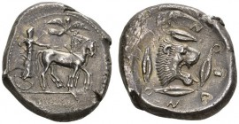 CLASSICAL COINS 
 SICILY 
 LEONTINOI 
 Tetradrachm, about 475 BC. AR 17.11 g. Slow quadriga r., the driver wearing long chiton and holding the rein...