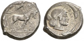 CLASSICAL COINS 
 SICILY 
 SYRACUSE 
 Tetradrachm, about 480-470 BC. AR 17.33 g. Slow quadriga r., the driver wearing long chiton and holding the r...