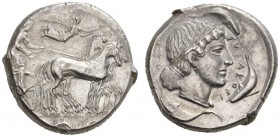 CLASSICAL COINS 
 SICILY 
 SYRACUSE 
 Tetradrachm, about 450-440 BC. AR 17.16 g. Slow quadriga r., the driver wearing long chiton, holding the rein...