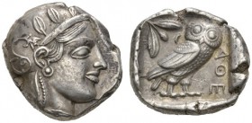 CLASSICAL COINS 
 ATTICA 
 ATHENS 
 Tetradrachm, about 440-430 BC. AR 17.01 g. Head of Athena r., wearing crested Attic helmet with neck-guard, dis...
