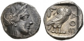 CLASSICAL COINS 
 ATTICA 
 ATHENS 
 Tetradrachm, about 435-420 BC. AR 17.17 g. Head of Athena r., wearing crested Attic helmet with neck-guard, dis...