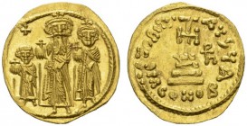COINS OF EAST ROME AND BYZANCE 
 With Her. Constantine and Heraclonas . Solidus, Constantinople , 637-638. AV 4.40 g. The three emperors standing fac...