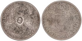 WORLD COINS: GREAT BRITAIN
1/2 Dólar. (1797). AR. Resello con el busto de Jorge III sobre 4 Reales de Carlos IV 1792 Potosí P.R. Encapsulada por PCGS...