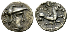 Aulerci Cenomani AR Quinarius, c. 100-50 BC 

Celtic Gaul. Aulerci Cenomani. AR Quinarius (12 mm, 1.22 g), c. 100-50 BC.
Obv. Helmeted head of Athe...