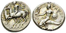 Tarentum, AR Nomos, c. 270 BC 

Calabria, Tarentum. AR Nomos (19-20 mm, 6.54 g), c. 270. 
Obv. The Dioscouri galloping to left; above, monogram of ...