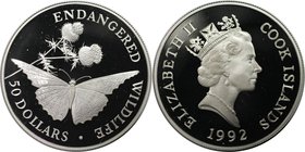 Weltmünzen und Medaillen, Cookinseln / Cook Islands. Gefährdete Wildtiere - Schmetterling und Distel. 50 Dollars 1992, Silber. 0.58 OZ. KM 244. Polier...