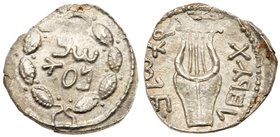 Judaea, Bar Kokhba Revolt. Silver Zuz (3.02 g), 132-135 CE. Undated, attributed to year 3 (134/5 CE). 'Simon' (Paleo-Hebrew) within wreath of thin bra...