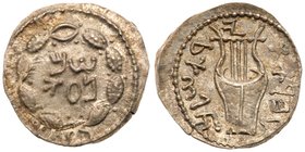 Judaea, Bar Kokhba Revolt. Silver Zuz (3.29 g), 132-135 CE. Undated, attributed to year 3 (134/5 CE). 'Simon' (Paleo-Hebrew) within wreath of thin bra...