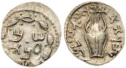 Judaea, Bar Kokhba Revolt. Silver Zuz (3.32 g), 132-135 CE. Undated, attributed to year 3 (134/5 CE). 'Simon' (Paleo-Hebrew) within wreath of thin bra...