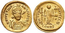 Justinian I (A.D. 527-565), Gold Solidus (4.44g). Mint of Constantinople. Officina B, helmeted and cuirassed bust, three-quarters facing, holding spea...