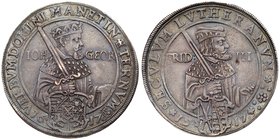 Saxony. Johann Georg I (1616-1656). Silver Taler,1617. On the 100th anniversary of the Reformation. Capped bust of Johann Georg right with sword divid...