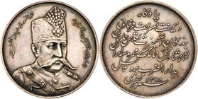 Muzaffar al-Din Shah (AH1313-1324 / 1896-1907AD). Silver Medallic 5 Krans, AH1318 (1900). Military uniformed bust facing three-quarters right. Rev. In...