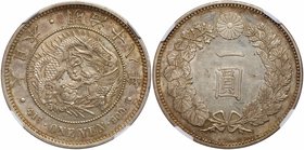 Mutsuhito (1867-1912). Silver 1-Yen, Meiji 18 (1885). (JNDA 01-10; KM Y-A25.2). In PCGS holder graded MS 63, lightly toned. Value $800 - UP