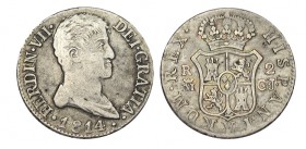 2 REALES. Madrid 1814-GJ. Tipo intermedio entre el "cara loco" y el busto propio. XC-915. 5,92 g. RARA. MBC