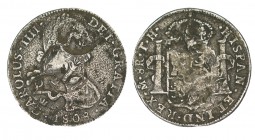 8 REALES. Congreso Chilpanzingo. 1808-TH (Busto de Carlos IV) Junto con el resello de arco y carcaj etc., presenta dos resellos de Morelos. W/KM no ci...