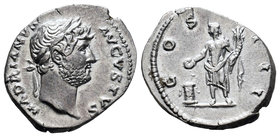 Hadrian. Denario. 127 d.C. Rome. (Spink-3476). (Ric-173). Rev.: COS III. Genius en pie a izquierda con cuerno de la abundancia y patera encima de alta...