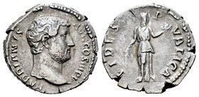 Hadrian. Denario. 137 d.C. Rome. (Spink-3492). (Ric-241a). Rev.: FIDES PVBLICA. Fides en pie a izquierda con maiz y bandeja de fruta. Ag. 3,53 g. VF. ...