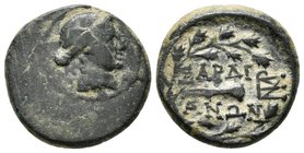 LYDIA, Sardes. Ae15. 133 a.C.-14 d.C. A/ Cabeza laureada de Apolo a derecha. R/ Clava a derecha dentro de corona de laurel, delante monograma. SNG Cop...