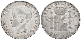 ALFONSO XIII. 1 Peso. 1897. Manila SGV. Cal-81. Ar. 24,97g. MBC-. Letras de arriba apenas se notan para circular como 5 Pesetas en España.