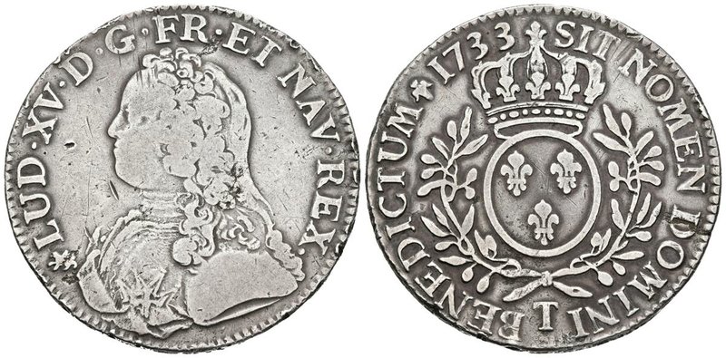 FRANCIA. Louis XV. Ecu. 1733. Nantes T. Gad. 321. Ar. 28,85g. Marquitas en anver...