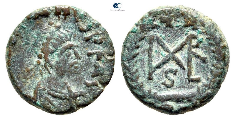 Marcian AD 450-457. Constantinople
Nummus Æ

11 mm., 1,10 g.



very fine...