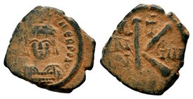 Tiberius Constantine II, 578-582.AE
Condition: Very Fine

Weight: 5,28 gr
Diameter: 20,15 mm