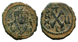Maurice Tiberius. A.D. 582-602. AE 
Condition: Very Fine

Weight: 2,98 gr
Diameter: 18,60 mm
