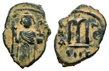 ARAB-BYZANTINE. Early Caliphate (636-660). Ae Fals. Imitative coinage.
Condition: Very Fine

Weight: 4,92 gr
Diameter: 25,80 mm