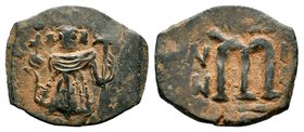 ARAB-BYZANTINE. Early Caliphate (636-660). Ae Fals. Imitative coinage.
Condition: Very Fine

Weight: 4,03 gr
Diameter: 20,80 mm