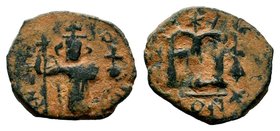 ARAB-BYZANTINE. Early Caliphate (636-660). Ae Fals. Imitative coinage.
Condition: Very Fine

Weight: 2,18 gr
Diameter: 16,20 mm