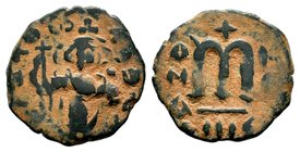 ARAB-BYZANTINE. Early Caliphate (636-660). Ae Fals. Imitative coinage.
Condition: Very Fine

Weight: 4,24 gr
Diameter: 22,65 mm