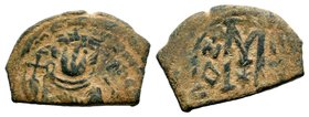 ARAB-BYZANTINE. Early Caliphate (636-660). Ae Fals. Imitative coinage.
Condition: Very Fine

Weight: 6,84 gr
Diameter: 18,65 mm