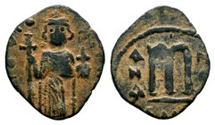 ARAB-BYZANTINE. Early Caliphate (636-660). Ae Fals. Imitative coinage.
Condition: Very Fine

Weight: 2,50 gr
Diameter: 22,00 mm