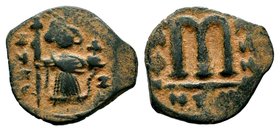 ARAB-BYZANTINE. Early Caliphate (636-660). Ae Fals. Imitative coinage.
Condition: Very Fine

Weight: 2,54 gr
Diameter: 19,30 mm