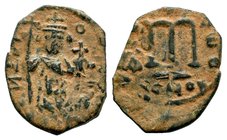 ARAB-BYZANTINE. Early Caliphate (636-660). Ae Fals. Imitative coinage.
Condition: Very Fine

Weight: 4,37 gr
Diameter: 24,80 mm