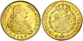1807. Carlos IV. Madrid. FA. 2 escudos. (Cal. 350). 6,80 g. Rayitas, pero bella. Brillo original. Ex Áureo 27/02/2002, nº 768. Escasa así. EBC+.