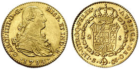 1794. Carlos IV. Sevilla. CN. 2 escudos. (Cal. 446). 6,73 g. Bella. Ex Áureo 31/05/2006, nº 728. Escasa así. EBC/EBC+.