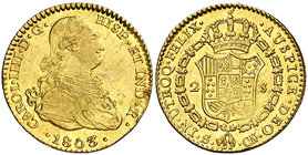 1803/2. Carlos IV. Sevilla. CN. 2 escudos. (Cal. 455 var). 6,75 g. Leve hojita. Parte de brillo original. MBC+/EBC.