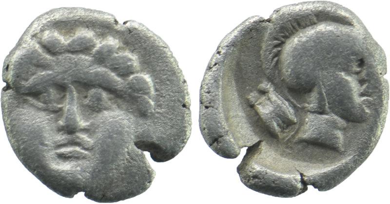Pisidia, AR Obol Selge 3rd Century BC. 
Facing head of Gorgoneion 
Rev: Helmeted...